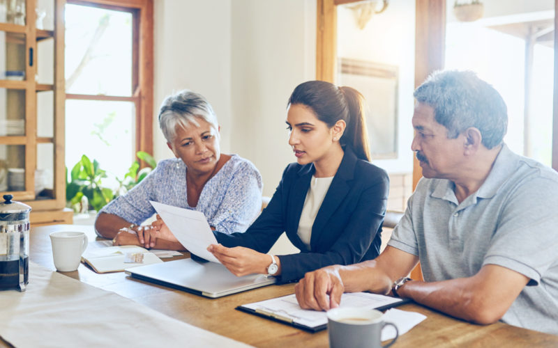 estate taxes, accountant helping senior couple with estate taxes