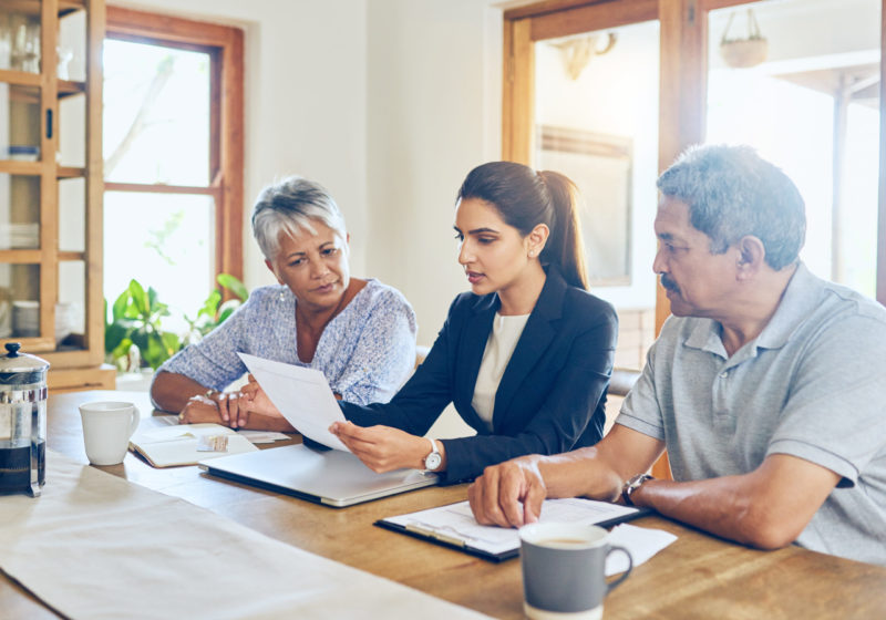 estate taxes, accountant helping senior couple with estate taxes