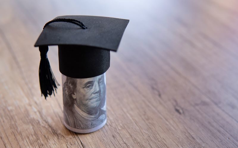 Picture of college cap with money underneath