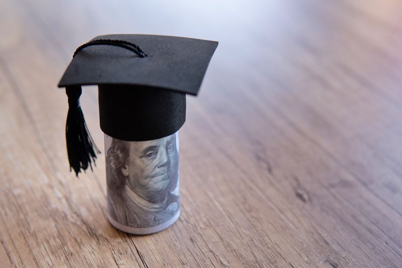 Picture of college cap with money underneath