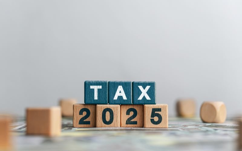 Picture of the word "tax" in blocks over "2025" to signal tax planning.